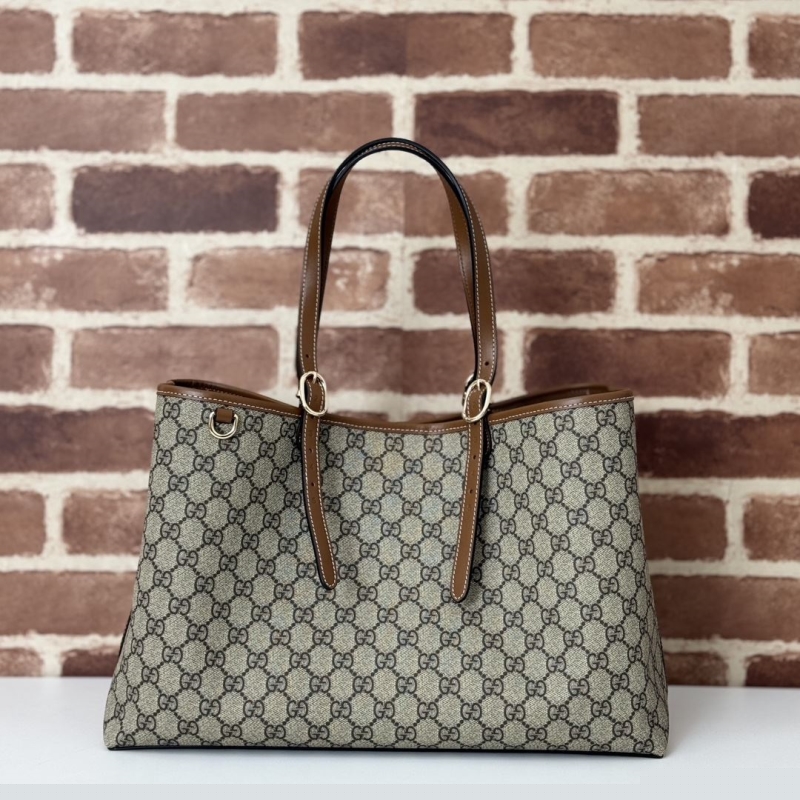 G*u*i shopping bags